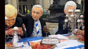 A symbolic demonstration, street-theater performance staged by pro-Palestine activists outside Washington, D.C.’s Union Station in November 2025, ahead of Thanksgiving